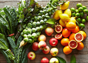 a group of fruits and vegetables on a wood surface Healthy Weight Loss Diets Dumbarton